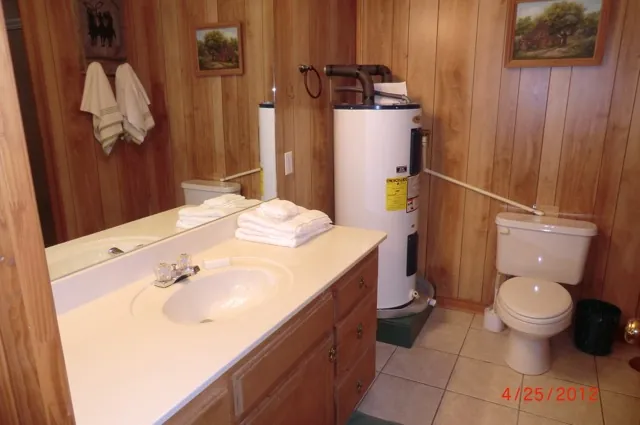 Cabin bathroom with vanity and fresh towels