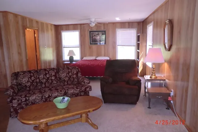 Cabin great room with bed, sofa and recliner