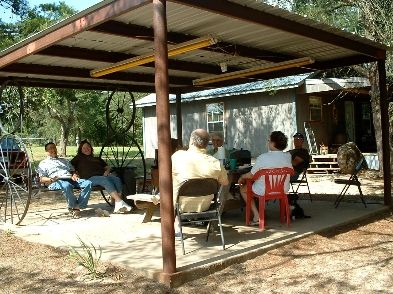 Guests visiting under the covered pavilion